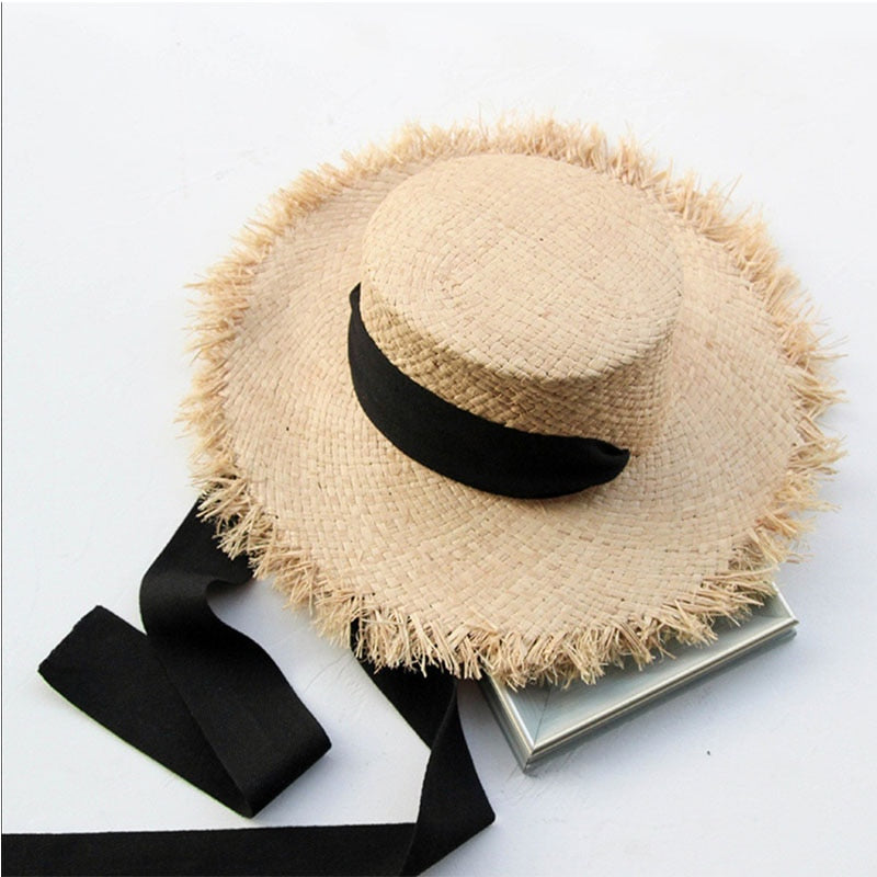 Children’s Raffia wide brimmed straw hat