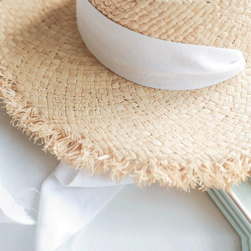 Children’s Raffia wide brimmed straw hat