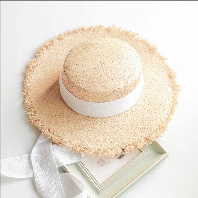 Children’s Raffia wide brimmed straw hat